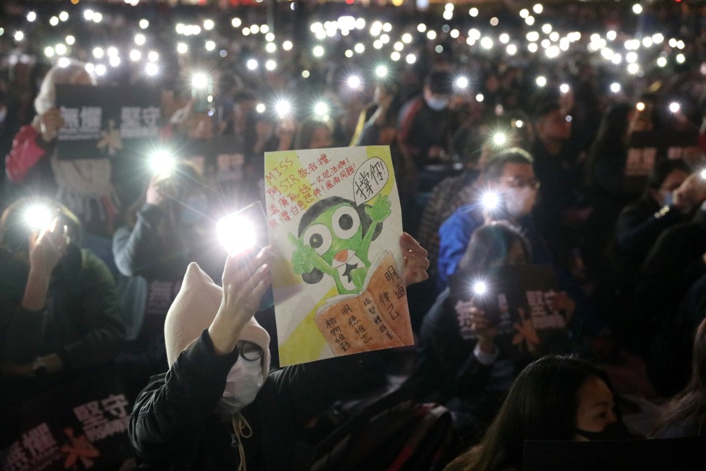 A poster spells out all the virtues that students can imbibe from teachers, at a demonstration in Hong Kong’s Central business district on January 3 sparked by the government’s handling of protest-related complaints against educators. Photo: K.Y. Cheng