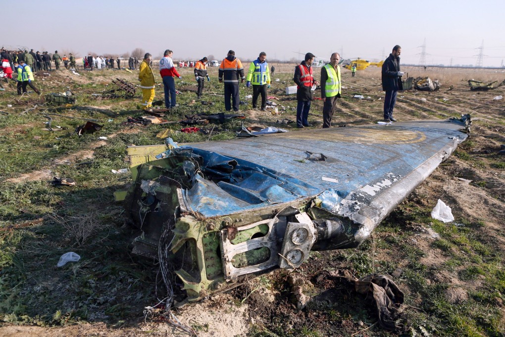 Rescue teams work at the scene of a Ukrainian airliner that crashed soon after take-off near Imam Khomeini airport in Tehran. Photo: IRNA via AFP