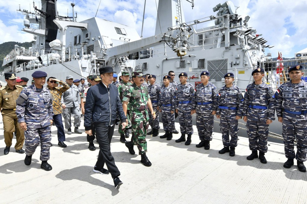 Indonesian President Joko Widodo inspects troops during his visit to the Natuna Islands on January 8. Photo: AP