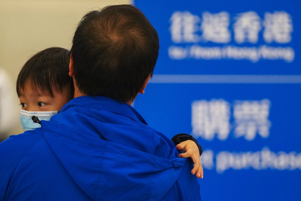 Passengers at the West Kowloon High-Speed Railway Station in Hong Kong wear masks as a precaution following the outbreak of an unidentified form of pneumonia in Wuhan, China. Photo: Sam Tsang