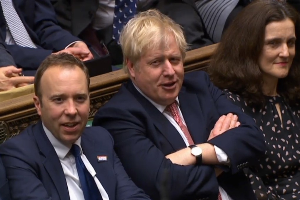 Britain's Prime Minister Boris Johnson reacts after his government wins the vote on the third reading of the European Union (Withdrawal Agreement) Bill in the House of Commons in London on Thursday. Photo: PRU via AFP