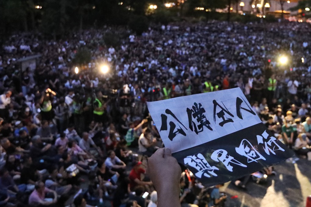 Thousands of civil servants gathered for a lawful rally in Central last August. A handful of their colleagues have been arrested for joining illegal events. Photo: Felix Wong
