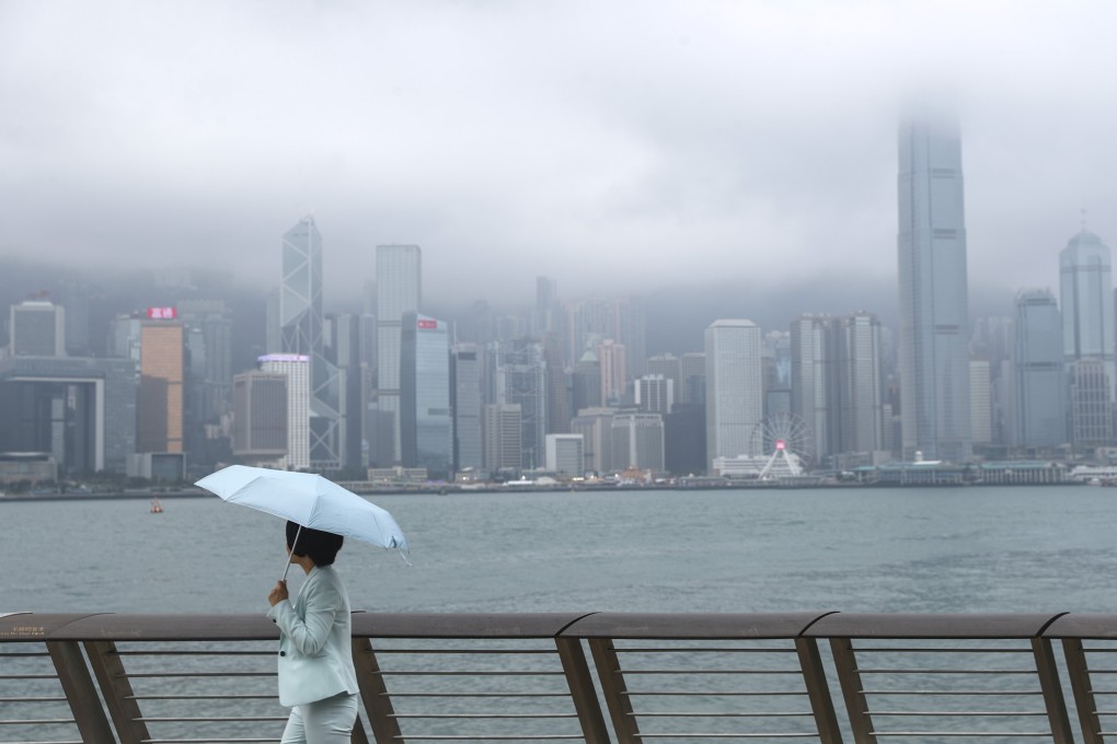 Fog covers the tops of skyscrapers along Hong Kong’s iconic Victoria Harbour skyline, as seen from the Tsim Sha Tsui promenade on December 19, 2019. Photo: Sam Tsang