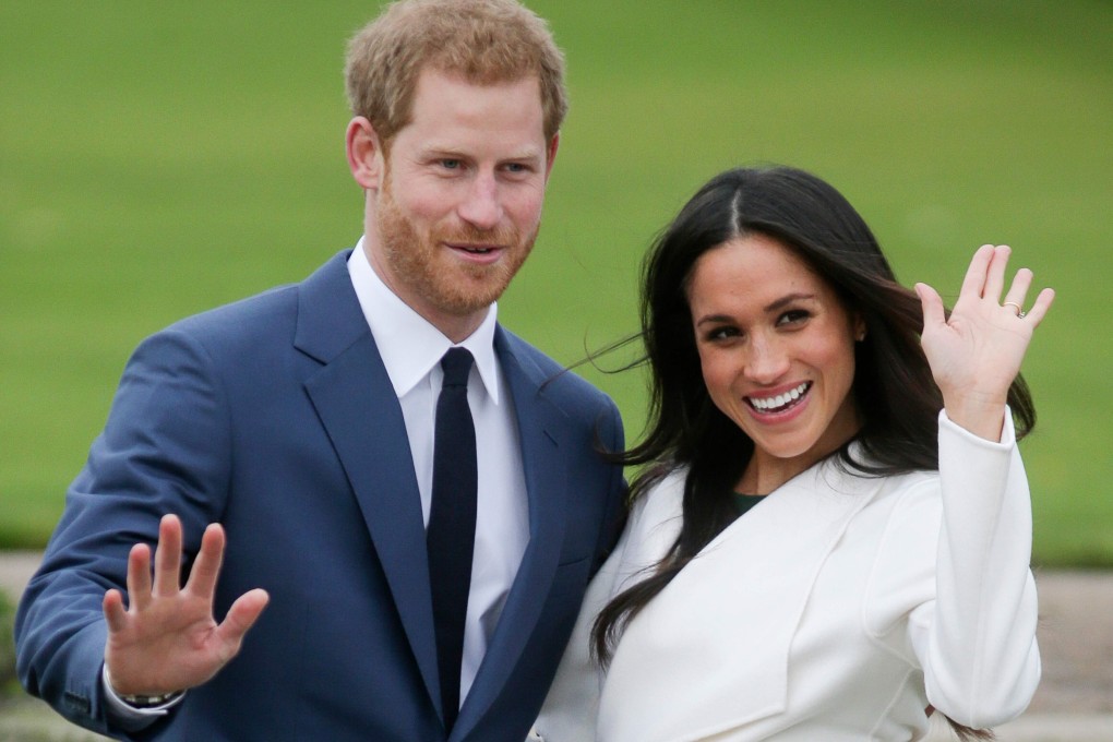Britain’s Prince Harry and Meghan Markle pose for a photograph in the Sunken Garden at Kensington Palace in November 2017. Photo: AFP