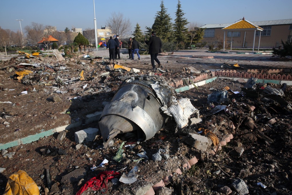 Rescue teams work amid the debris after a Ukrainian plane carrying 176 passengers crashed near Imam Khomeini airport in Tehran on Wednesday. Photo: AFP