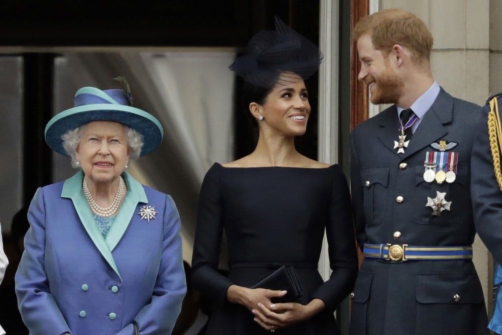 Britain's Queen Elizabeth, Meghan, Duchess of Sussex, and Prince Harry at Buckingham Palace in July 2018. Photo: AP