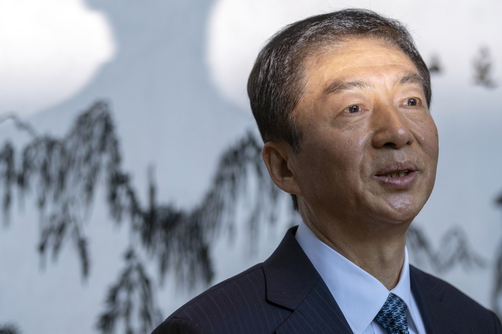 Luo Huining, the new director of the central government’s liaison office, speaks at a news conference in Hong Kong on Monday. Photo: Bloomberg