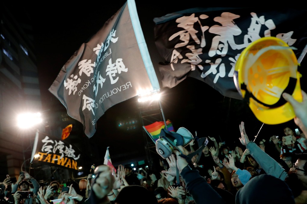 Hong Kong anti-government protesters hold a rally as they celebrate the election of victory of incumbent Taiwan President Tsai Ing-wen. Photo: Reuters
