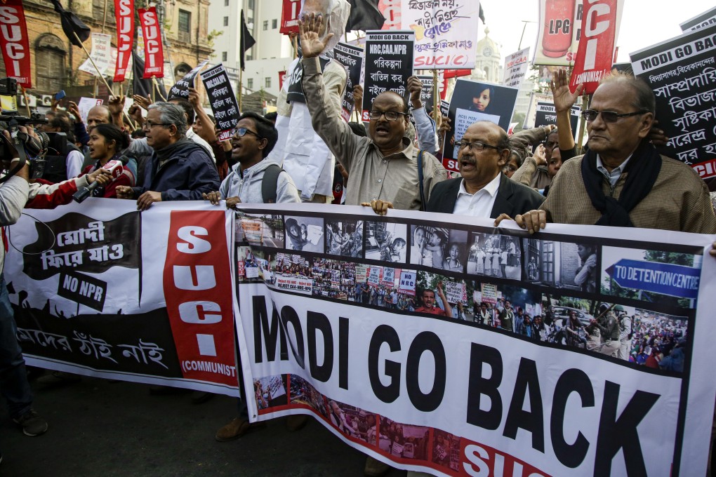 Members and activists of different leftist organisations and university students protest against recently implemented citizenship law and Prime Minister Narendra Modi's visit, in Kolkata. Photo: AP Photo