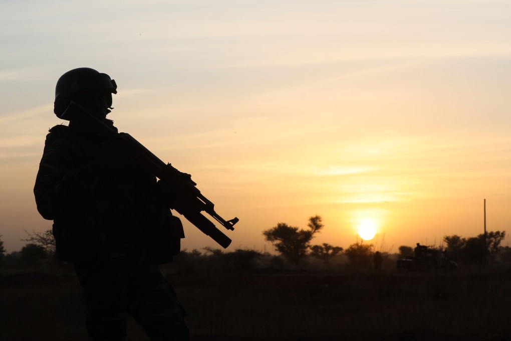 A soldier stands guard at the Martyr Quarter on December 22, 2019. Photo: AFP