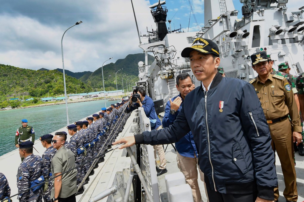 Indonesia's president Joko Widodo visits a military base in the Natuna islands, which border the South China Sea. Photo: AFP