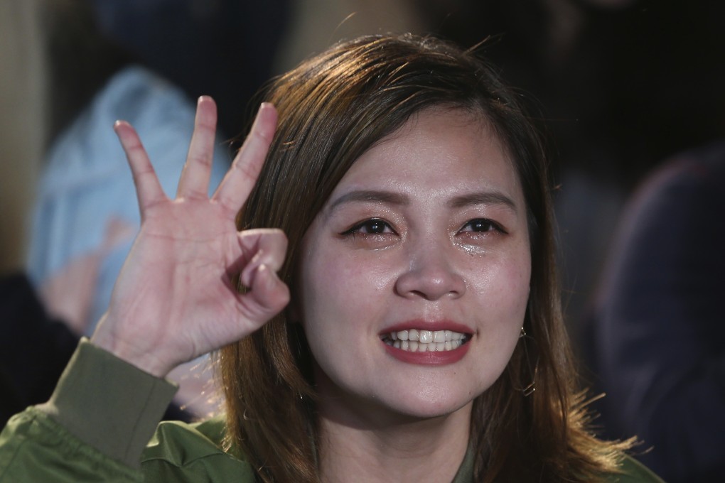 A Tsai Ing-wen supporter weeps tears of joy as the results come in. Photo: AP