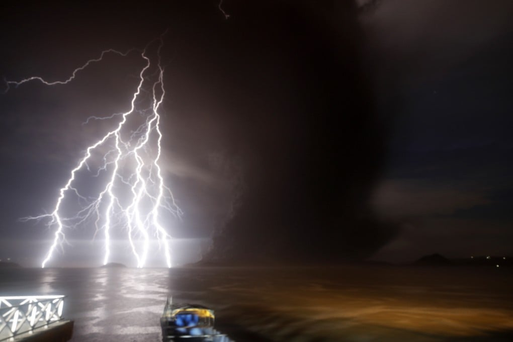 A lightning strike over Taal Volcano during its eruption. Photo: EPA
