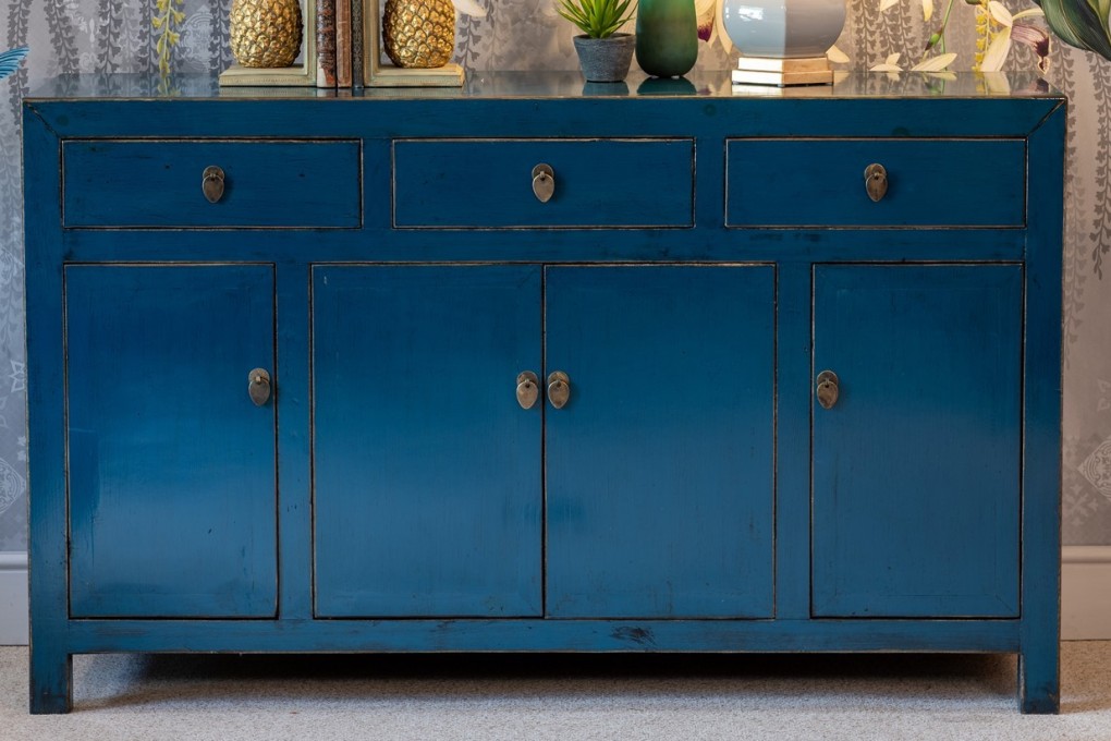 A distressed Chinese sideboard finished in a cobalt blue lacquer from Orchid Furniture in the UK. Photo: Orchid Furniture