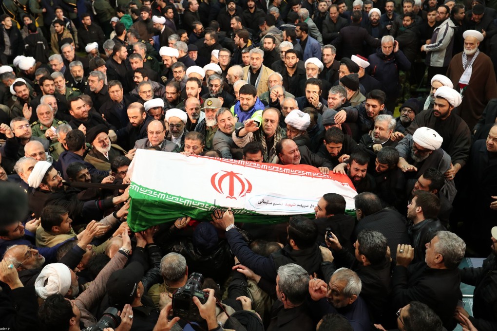 Qassem Soleimani’s coffin is carried through Tehran on Monday. Photo: DPA
