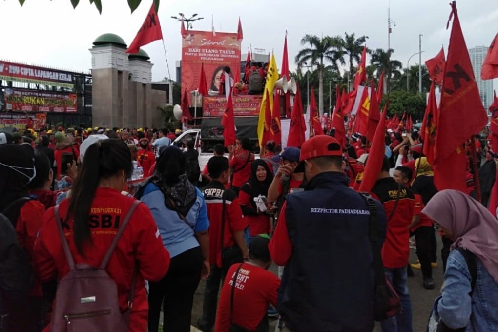 Workers protest in Jakarta over Indonesia’s new labour law. Photo: Muhammad Rusmadi