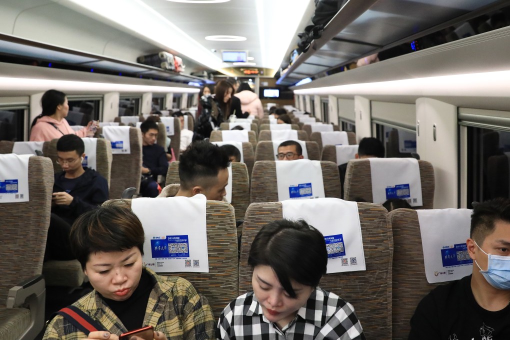 Passengers on the high-speed train from Beijing to Hong Kong. Thailand’s case is the first reported infection outside China. Photo: May Tse