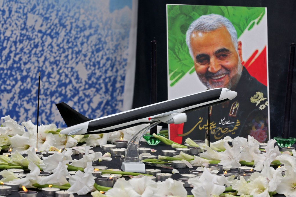 A poster of slain Iranian military commander Qassem Soleimani is seen at a memorial for the victims of the Ukrainian plane crash at the University of Tehran on Tuesday. Photo: AFP