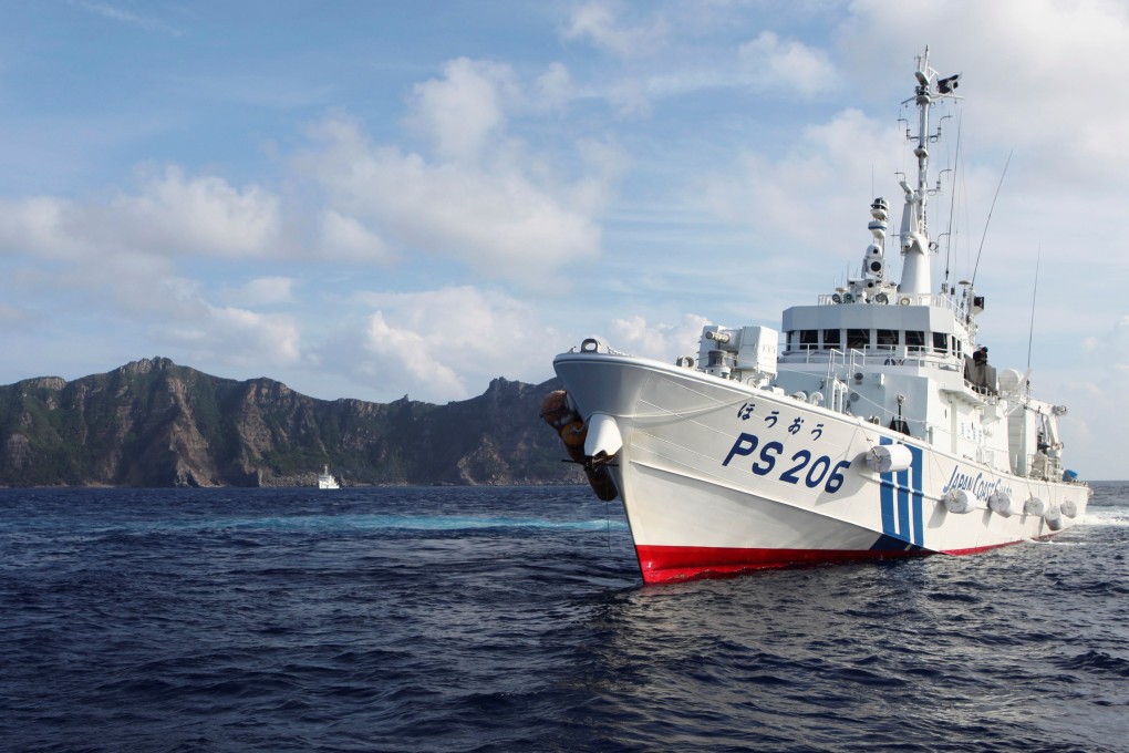 A Japanese coastguard ship sails near the disputed Diaoyu or Senkaku islands. Photo: Reuters