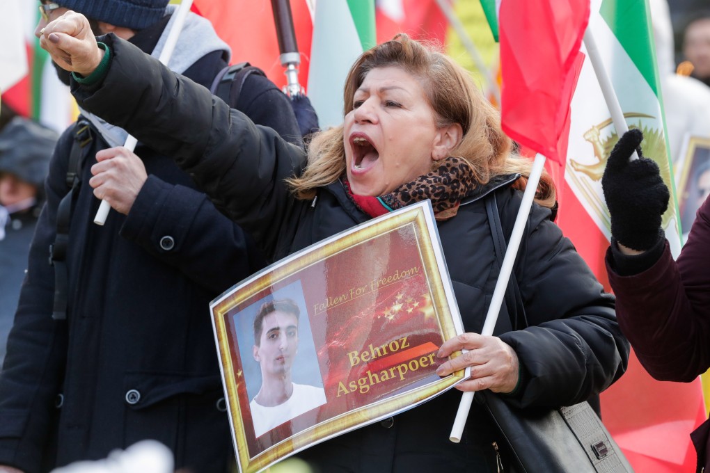 Iranian opposition activists rally on Friday to urge the EU to reimpose UN Security Council sanctions on Iran. Photo: EPA-EFE