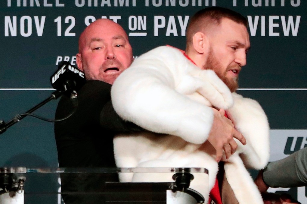 Conor McGregor (right) is restrained by UFC president Dana White during a news conference ahead of his UFC 205 against Eddie Alvarez in 2018. Photo: AP