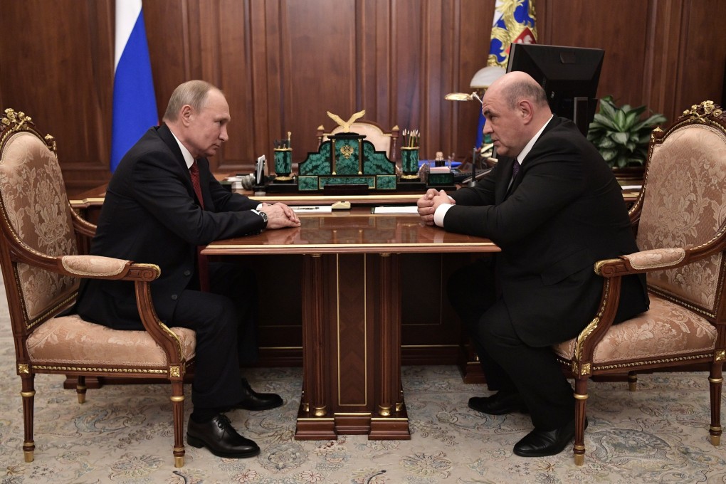 Mikhail Mishustin meets with Russian President Vladimir Putin at the Kremlin in Moscow. Photo: EPA