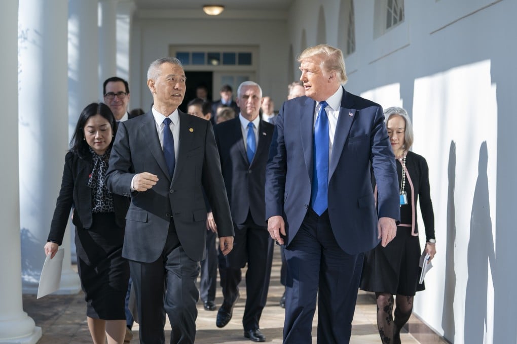 Vice-Premier Liu He (left) said the phase one deal he signed with US President Donald Trump will allow China to carry out domestic economic reform. Photo: DPA