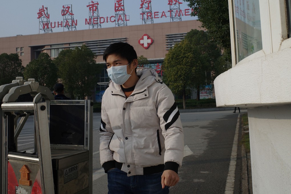 A man leaves a treatment centre in Wuhan, where 41 people have tested positive for the new strain of the coronavirus. Photo: AFP