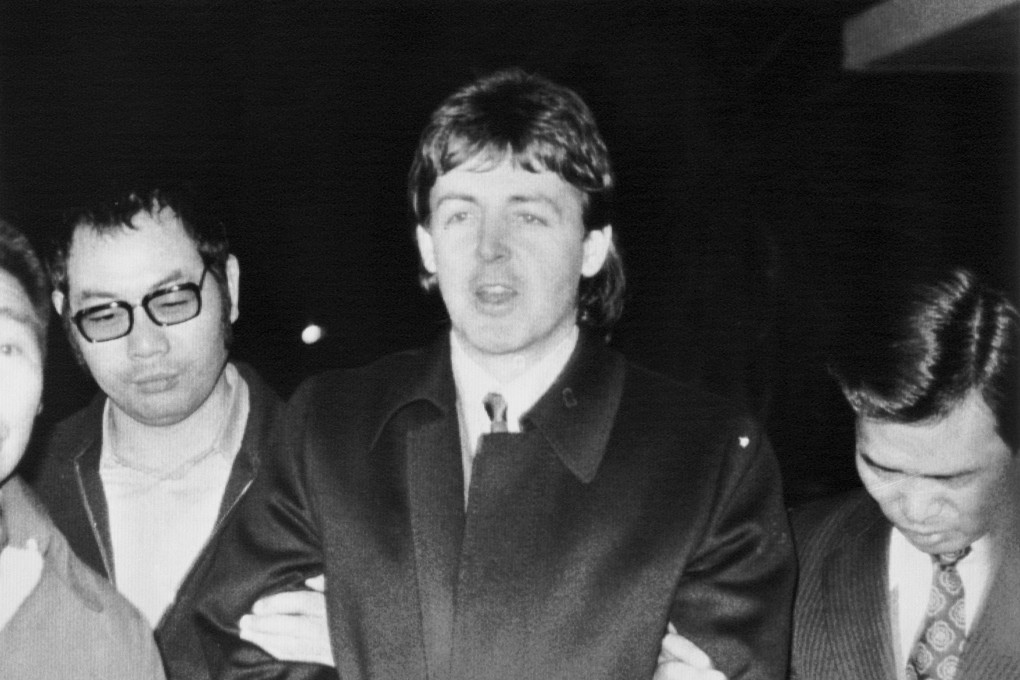 A handcuffed Paul McCartney is arrested for drugs possession at a Japanese airport. Photo: SCMP