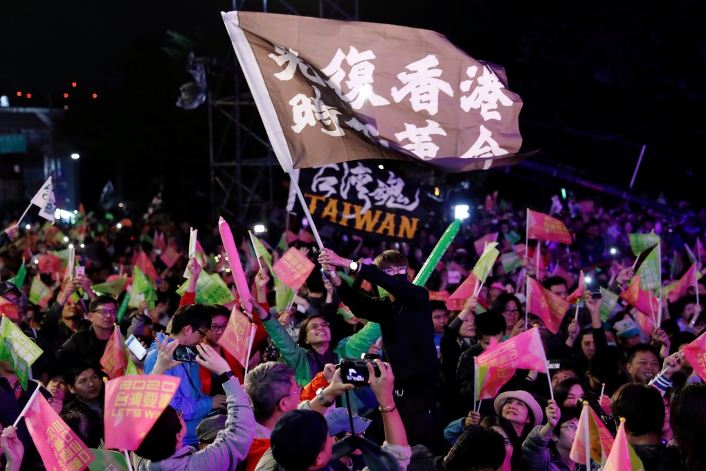 Hong Kong anti-government protesters attend a rally in support of Taiwan President Tsai Ing-wen in Taipei. Photo: Reuters