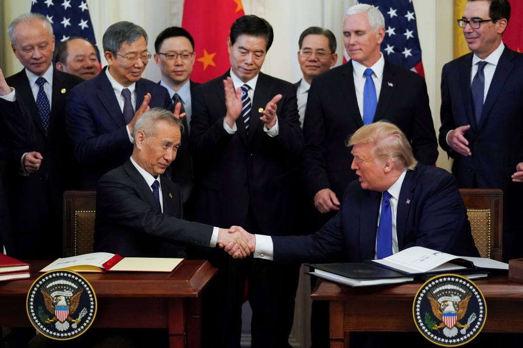 Chinese Vice-Premier Liu He and US President Donald Trump signed the phase one trade deal at the White House on Wednesday in Washington. Photo: Reuters