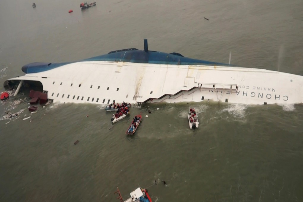 South Korean rescue boats and fishing boats approach the sinking South Korean ferry Sewol in the waters off Jindo, South Korea, on April 16, 2014. More than 300 people died, mostly school pupils. Photo: AP