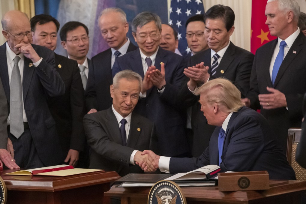 Inside the White House on Wednesday, Chinese Vice-Premier Liu He and US President Donald Trump took part in the signing ceremony for a trade agreement. Outside the White House, a variety of Chinese protesters hoped to draw attention to their issues. Photo EPA-EFE
