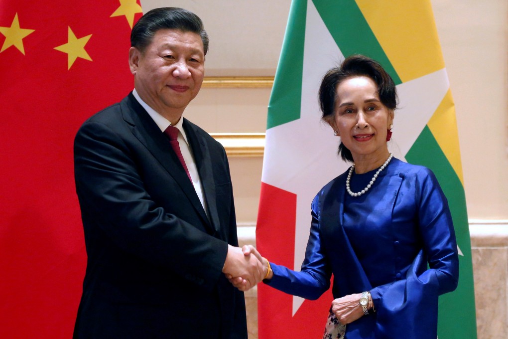 Chinese President Xi Jinping and Myanmar's State Counsellor Aung San Suu Kyi shake hands at the Presidential Palace in Naypyidaw. Photo: Reuters