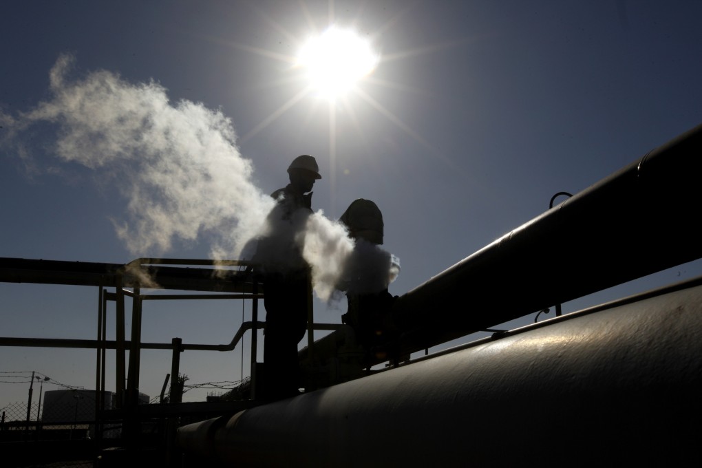 A Libyan oil worker at a refinery inside the Brega oil complex, in Brega, eastern Libya. Photo: AP Photo