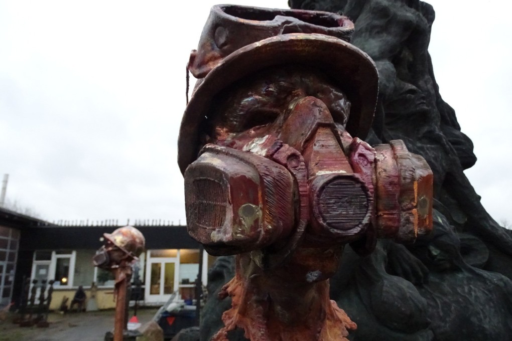 Jens Galschiot’s new work, which depicts torn and twisted bodies to mourn those killed in the Tiananmen Square crackdown, also features faces of Hong Kong’s protesters, with helmets, goggles and gas masks. Photo: Handout
