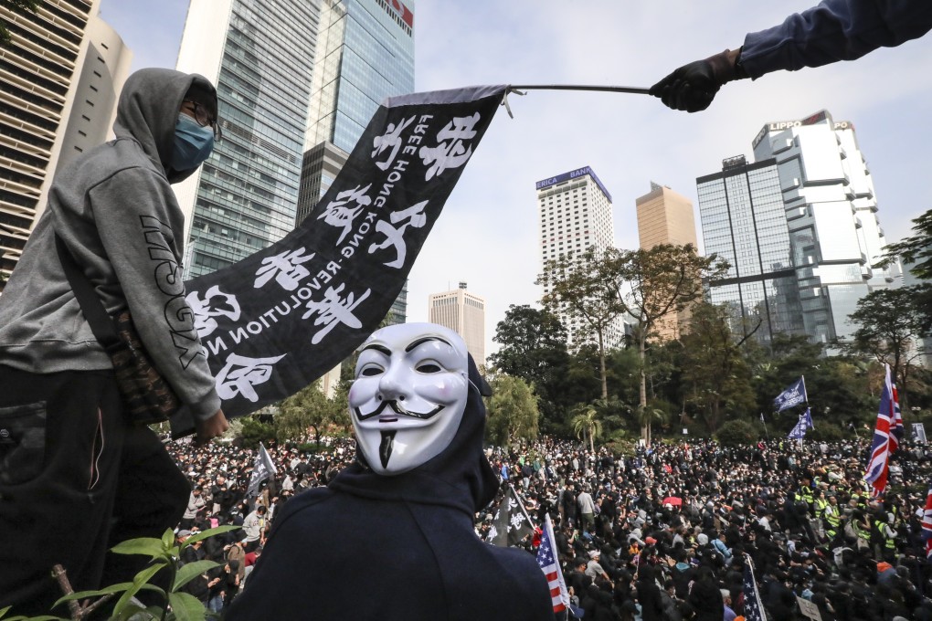 Anti-government protesters hold a sit in protest at Charter Garden in Central on Sunday. Photo: Felix Wong
