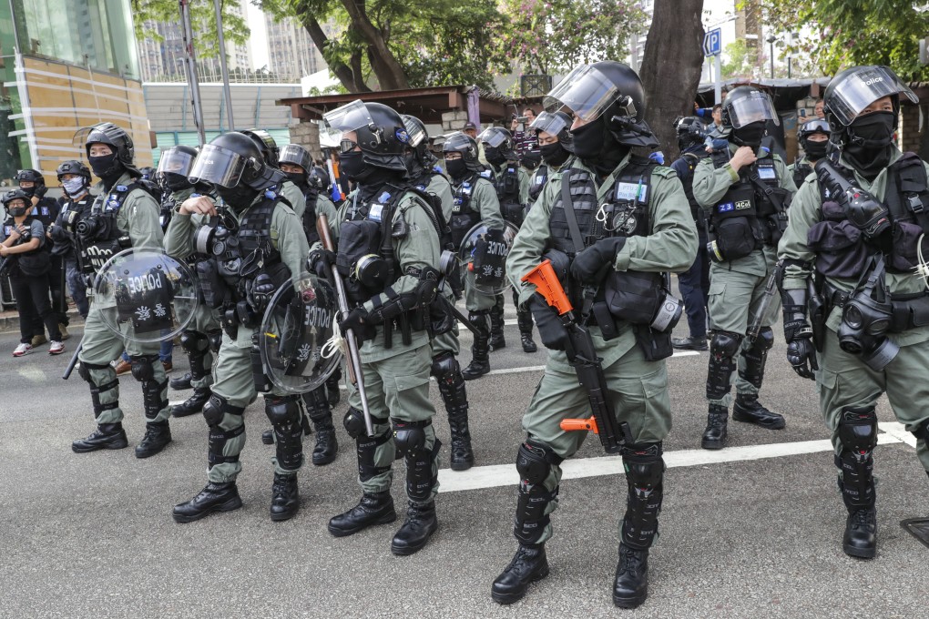 Riot police on standby as protesters take part in a rally from North District Playground to Sheung Shui MTR Station on January 5. Photo: Edmond So
