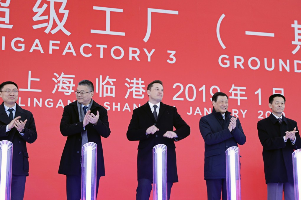 Tesla’s CEO Elon Musk (centre), during an event at the site of the company’s manufacturing facility in Shanghai on Monday, January 7, 2019. Shanghai’s Mayor Ying Yong was standing to Musk’s left. Photo: Bloomberg