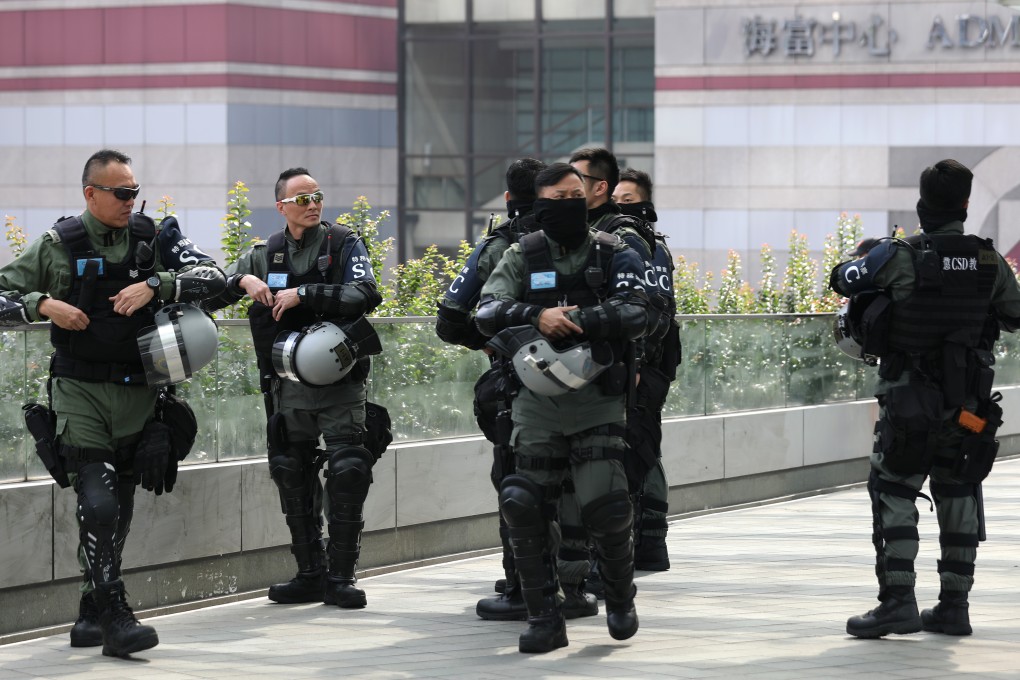 Special constables from the Correctional Services Department on duty in Central. Photo: Xiaomei Chen