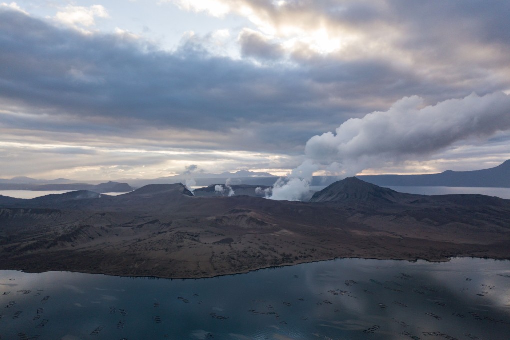 Taal Volcano in Batangas province in the Philippines continues to emit steam after an eruption on January 12, with a high-level alert still in place. Photo: AFP