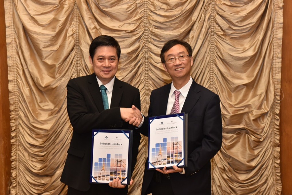 Edmond Lau (right), senior executive director of Hong Kong Monetary Authority and Mathee Supapongse, deputy governor of the Bank of Thailand, release a joint research report on the application of the central bank digital currencies in cross-border payments, on Wednesday. Photo: SCMP