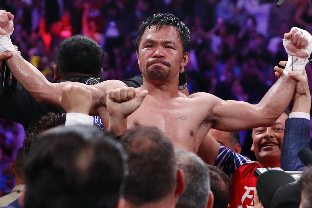 Manny Pacquiao celebrates after defeating Keith Thurman by split decision in a welterweight title fight in 2019. Photo: AP