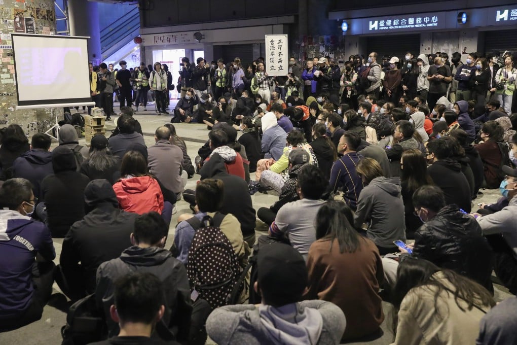 A crowd gathers outside Yuen Long MTR station for a rally on Tuesday night. Photo: Sam Tsang