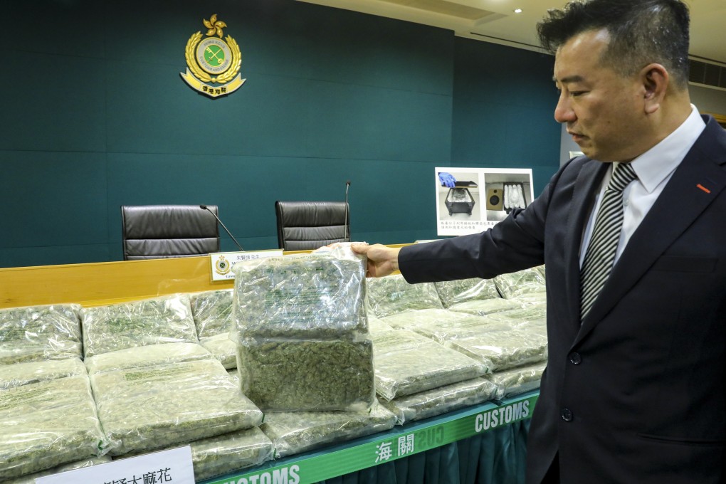 Superintendent Barry Chu with some of the cannabis uncovered in the seizure. Photo: Dickson Lee