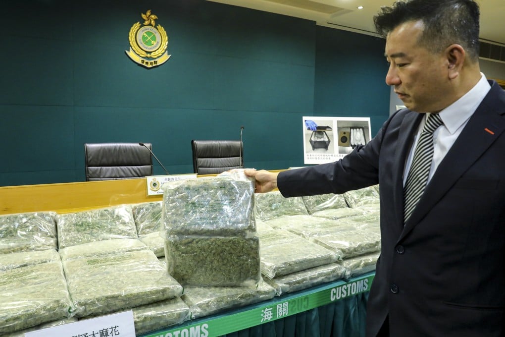 Superintendent Barry Chu with some of the cannabis uncovered in the seizure. Photo: Dickson Lee