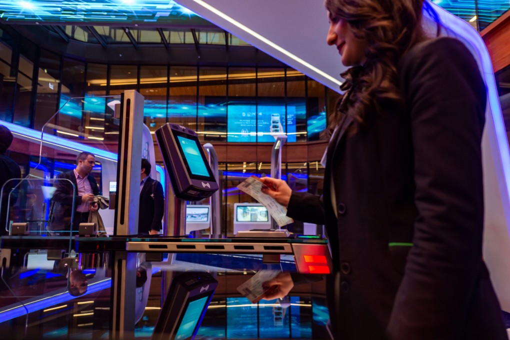 An attendant doing a facial recognition test using biometric technology at Istanbul Airport, which is also one of only a few airports currently to have its own 5G indoor network. Photo: AFP via Getty Images