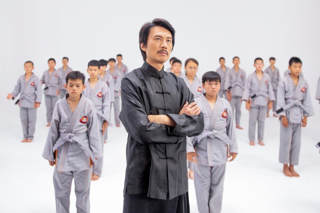 Dayo Wong (centre) in a still from The Grand Grandmaster (category IIA; Cantonese), which Wong also directs. Annie Liu co-stars.