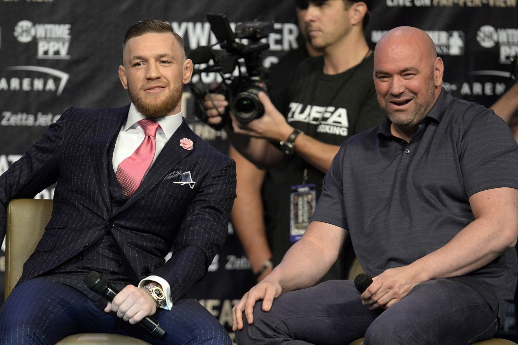 Conor McGregor (left) and UFC president Dana White watch as Floyd Mayweather speaks during a world tour press conference to promote their boxing bout in 2017. Photo: USA Today