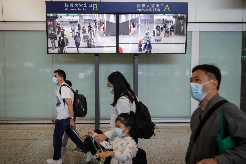 Travellers at the arrivals area of Hong Kong International Airport on Thursday. Photo: AFP